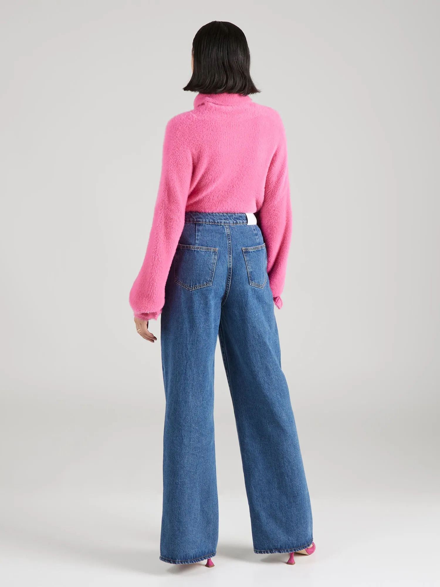 To optimize an e-commerce product title for Jella Denim, you should aim to include important modifiers that highlight key features such as style, fit, size, color, and any unique selling points. Heres a revised title:

Jella Denim Womens Classic High-Waist Skinny Jeans - Stretch Fit, Indigo Blue

This title uses common modifiers like gender, fit, style, and color to improve searchability and appeal to potential buyers.