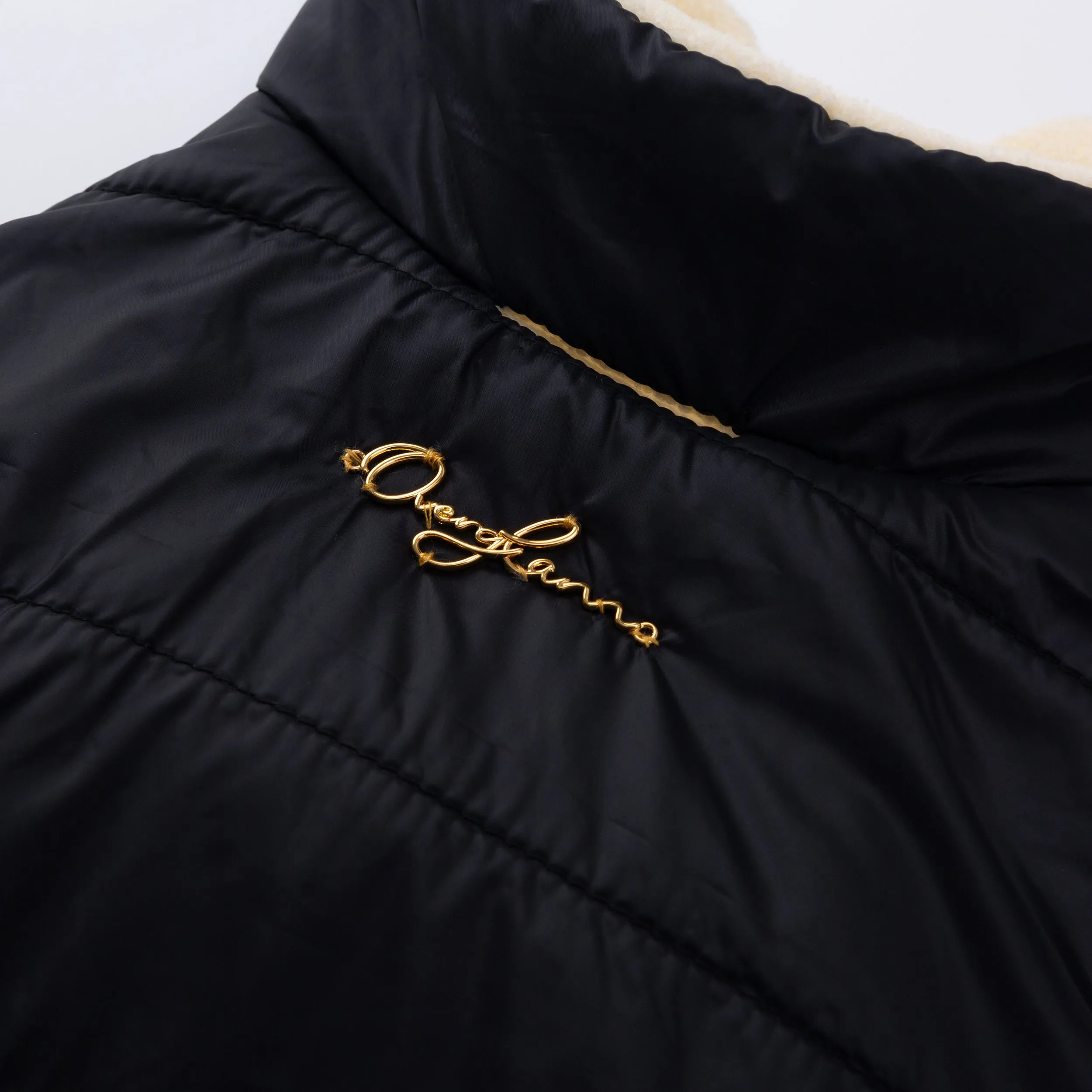 Sleeveless Puffer Jacket with Golden Logo