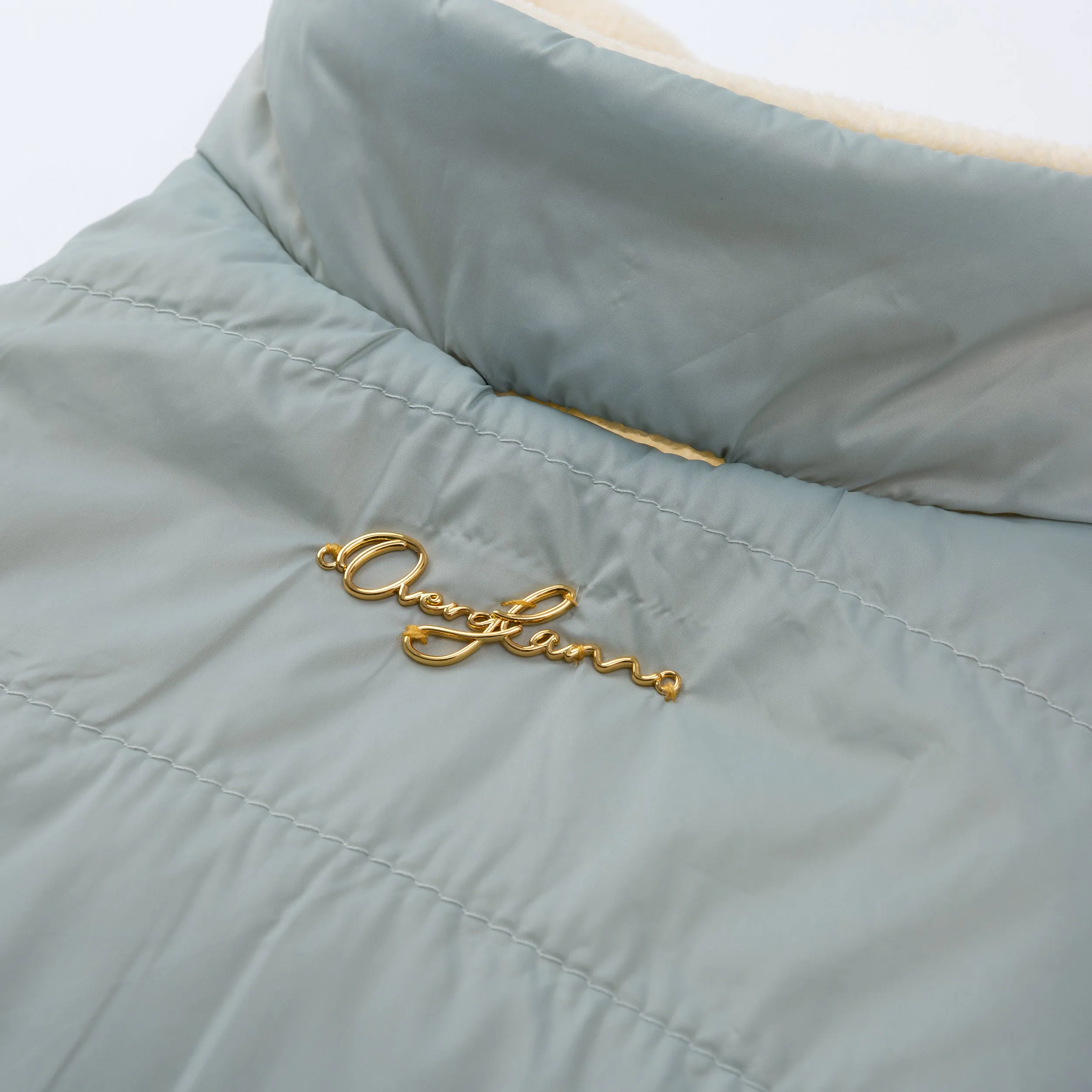 Sleeveless Puffer Jacket with Golden Logo